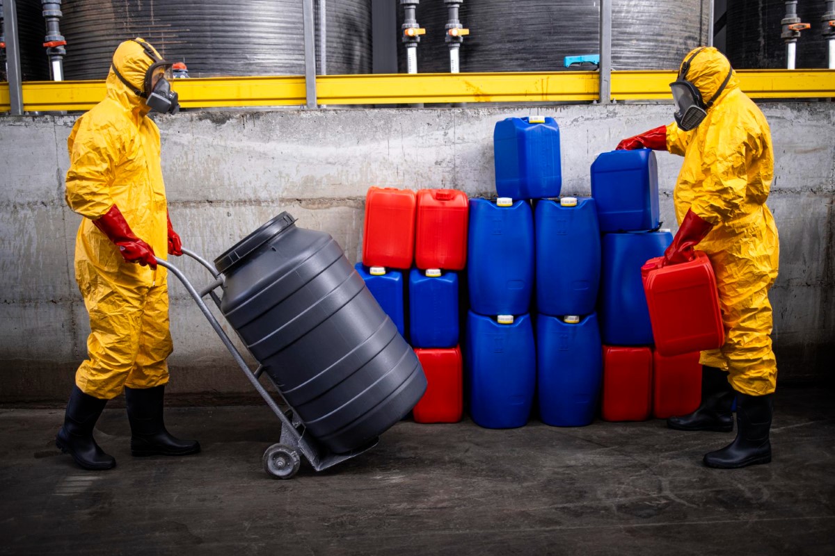 Coordinated handling of chemical containers maintains operational stability and reduces exposure to flammable risks.